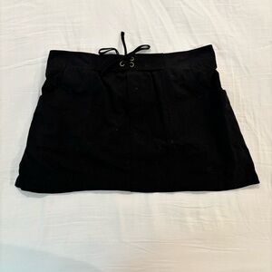 Kona Sol Women’s Black Swim Skirt with Elastic Waistband and Sewn-In Bottoms